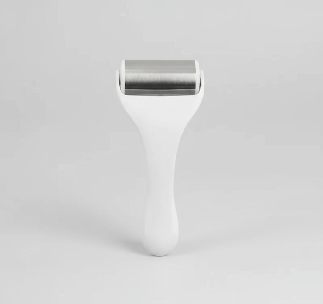 White roller with silver metal head on a white background