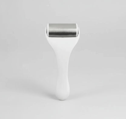 White roller with silver metal head on a white background